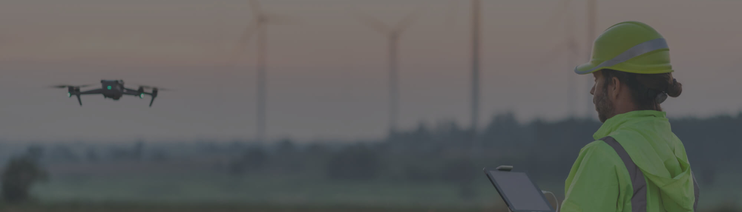 engineers-using-a-drone-to-check-wind-turbines