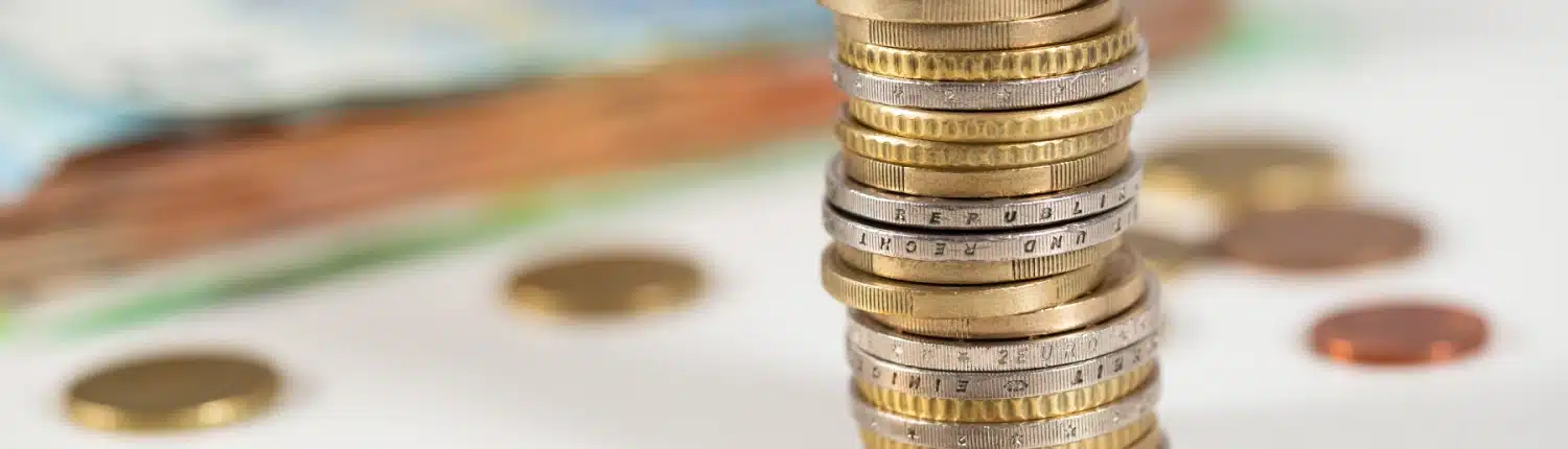 euro-coins-in-column-on-table-in-white-environment-2024-12-03-09-46-47-utc